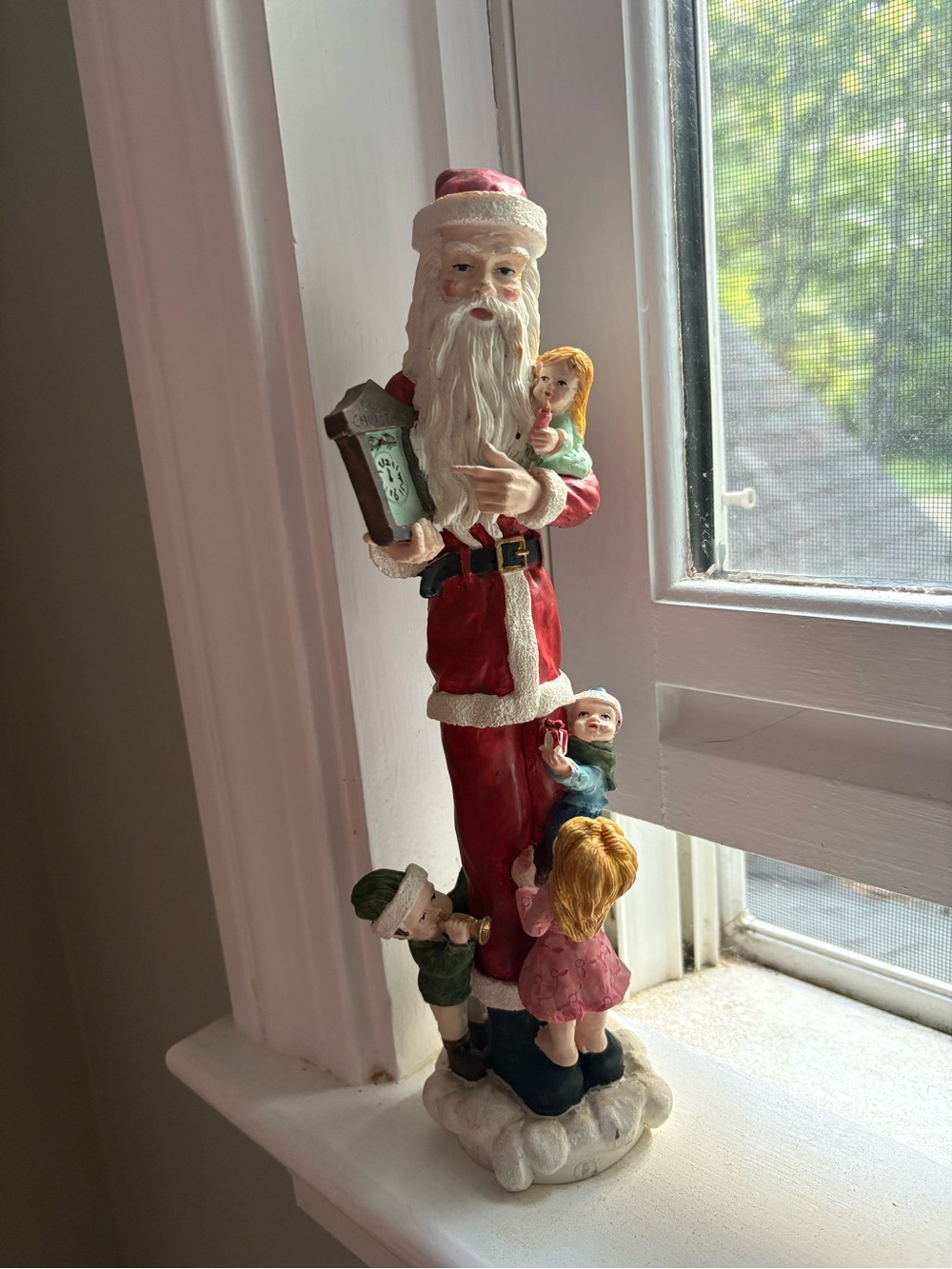 Hand-Painted Red Santa Figurine with Children Holiday Décor